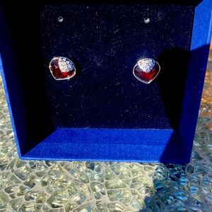 Swarovski ruby stud earrings.